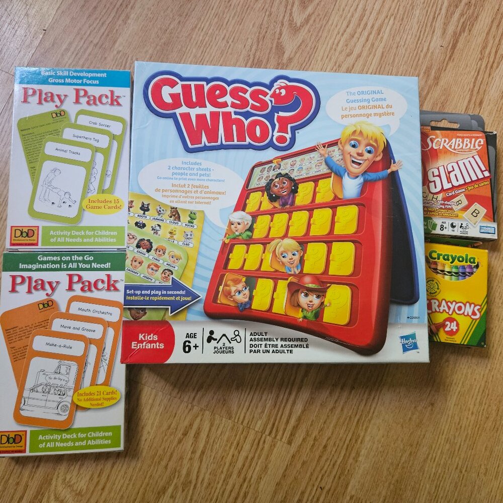 Kids Play Pack cards, Scrabble Slam, Guess Who game, crayons